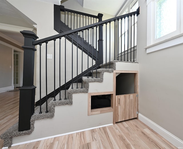 421 S Franklin St, Winamac, IN 46996 - stairs with wood finished floors and a high ceiling