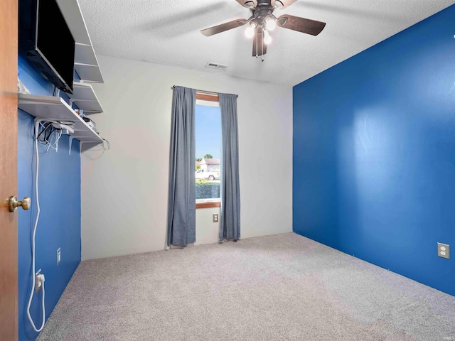 803 Larkwillow Ct, Huntertown, IN 46748 - unfurnished room featuring ceiling fan, carpet floors, and a textured ceiling