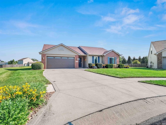 803 Larkwillow Ct, Huntertown, IN 46748 - ranch-style house with brick siding, an attached garage, and concrete driveway