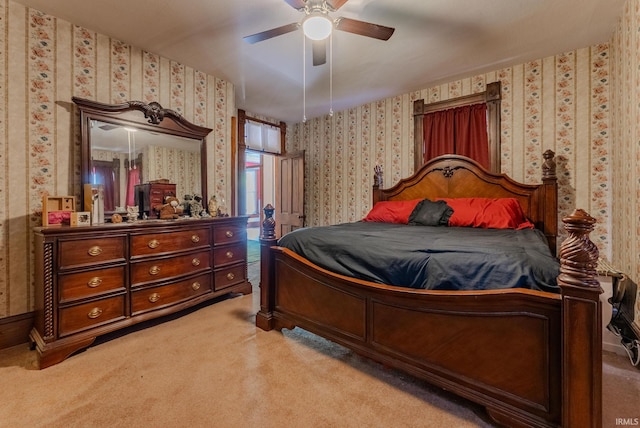 240 Elm St, Wabash, IN 46992 - carpeted bedroom with wallpapered walls and ceiling fan