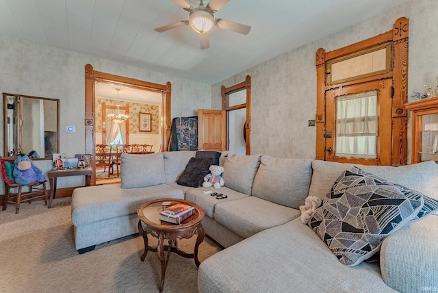240 Elm St, Wabash, IN 46992 - living area featuring a chandelier, a ceiling fan, and carpet flooring