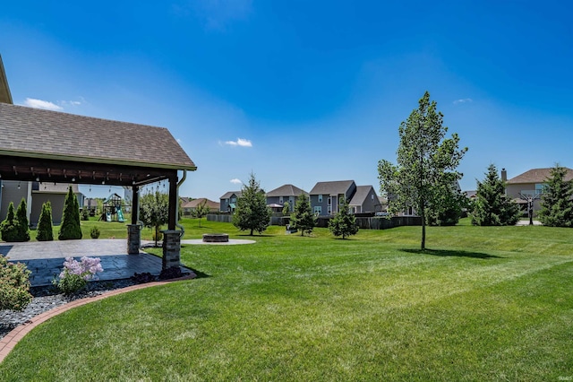 3032 Treviso Way, Fort Wayne, IN 46814 - view of yard featuring a fire pit, a residential view, and a patio