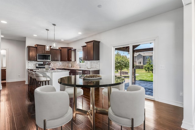 3032 Treviso Way, Fort Wayne, IN 46814 - dining area featuring plenty of natural light, recessed lighting, and dark wood finished floors