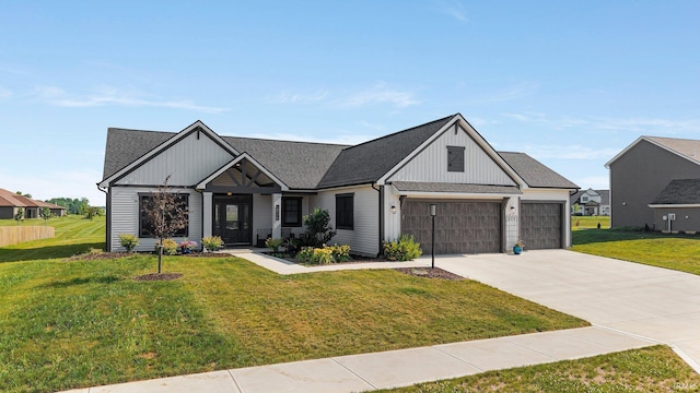 12116 Fazio Dr, Fort Wayne, IN 46818 - modern farmhouse with a front lawn, driveway, an attached garage, and a shingled roof