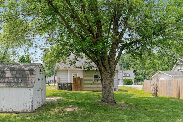 7201 Baer Rd, Fort Wayne, IN 46809 - view of yard featuring a storage unit