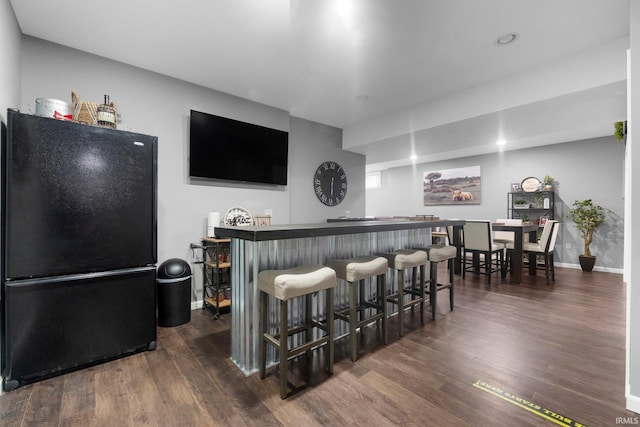 2608 Creeping Phlox Cv, Fort Wayne, IN 46818 - indoor dry bar with freestanding refrigerator, dark wood-style flooring, and recessed lighting