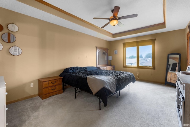 2608 Creeping Phlox Cv, Fort Wayne, IN 46818 - bedroom featuring a raised ceiling, light carpet, ceiling fan, and ornamental molding