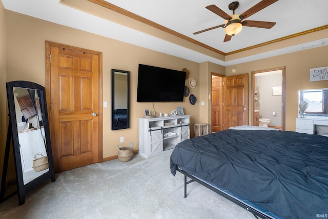2608 Creeping Phlox Cv, Fort Wayne, IN 46818 - bedroom featuring a tray ceiling, carpet flooring, ornamental molding, ensuite bath, and ceiling fan