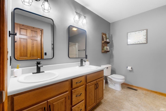2608 Creeping Phlox Cv, Fort Wayne, IN 46818 - bathroom featuring double vanity and toilet