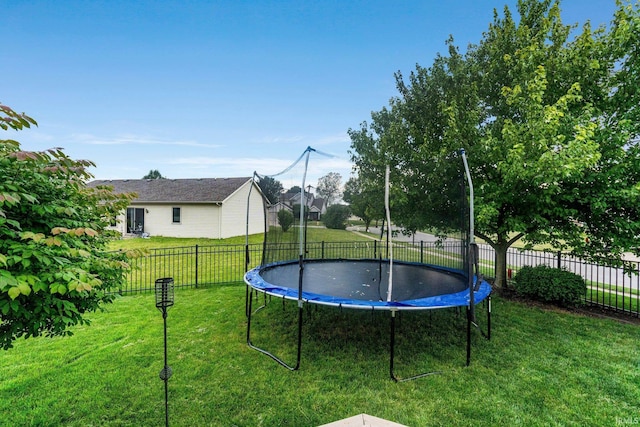 2608 Creeping Phlox Cv, Fort Wayne, IN 46818 - fenced backyard with a trampoline