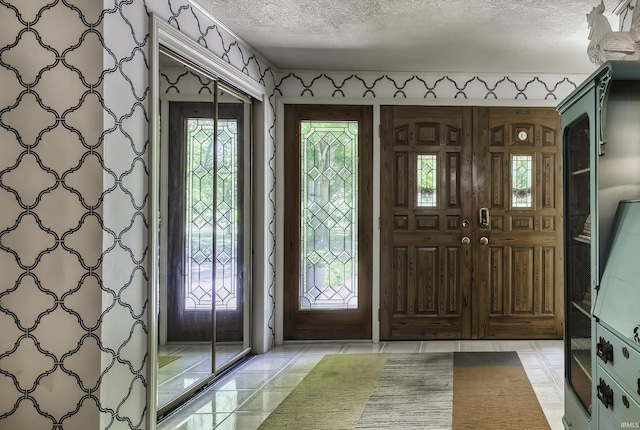420 E Cedar Canyons Rd, Huntertown, IN 46748 - foyer entrance with a textured ceiling
