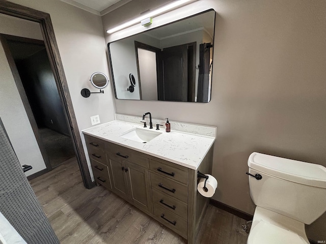 140 W 100 S Rd, Lagrange, IN 46761 - bathroom featuring wood finished floors, vanity, and ornamental molding