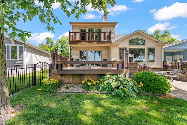 2624 E Stalf Rd, Columbia City, IN 46725 - rear view of property with a balcony, a chimney, and a wooden deck