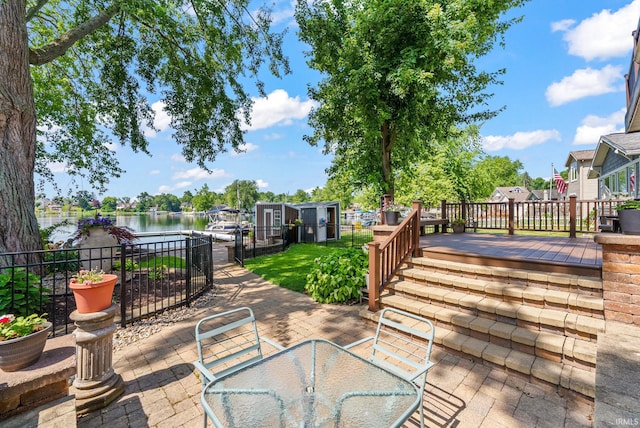 2624 E Stalf Rd, Columbia City, IN 46725 - view of patio featuring outdoor dining space, a dock, and a deck with water view