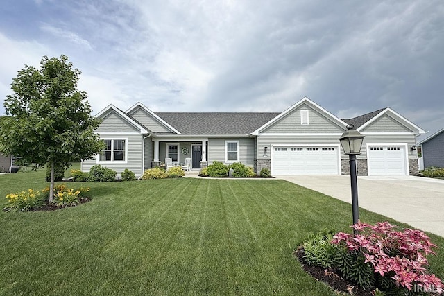 67320 Brentwood Dr, Goshen, IN 46526 - view of front of property featuring concrete driveway, a garage, a front yard, stone siding, and a porch