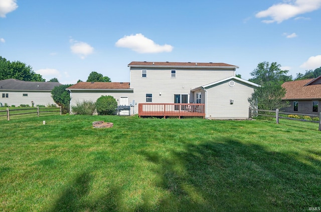 20860 Wyngate Court 20860Wyngate Ct S Bend, In 46614-5178, South Bend, IN 46614 - back of property featuring a fenced backyard, a deck, and a fire pit