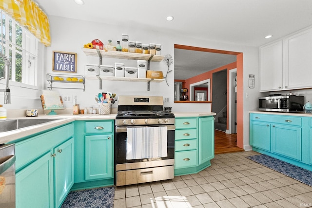 321 W Michigan St, New Carlisle, IN 46552 - kitchen featuring stainless steel appliances, light countertops, recessed lighting, and light tile patterned floors