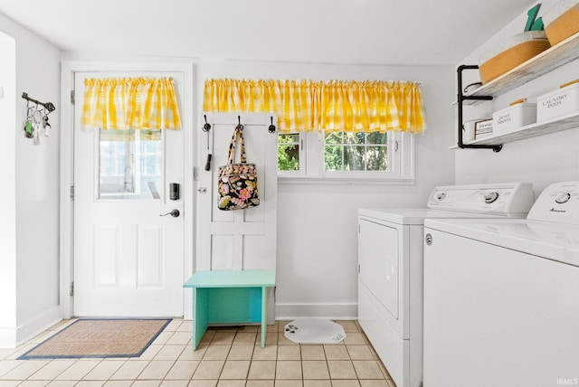 321 W Michigan St, New Carlisle, IN 46552 - laundry room with light tile patterned floors and independent washer and dryer