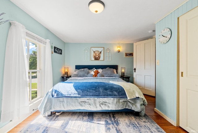 321 W Michigan St, New Carlisle, IN 46552 - bedroom featuring wood finished floors and baseboards