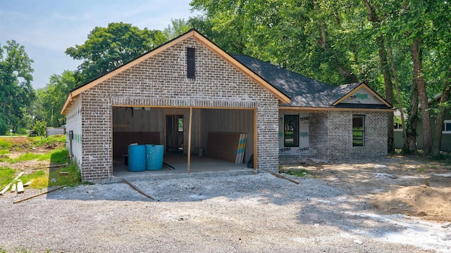 4285 N Elm St, Richland, IN 47634 - view of front of house featuring brick siding and a garage