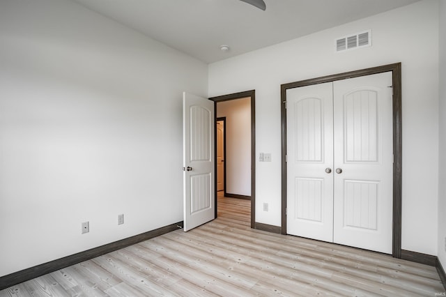 8622 Alamasa Pl, Fort Wayne, IN 46835 - unfurnished bedroom with light wood-type flooring and a closet