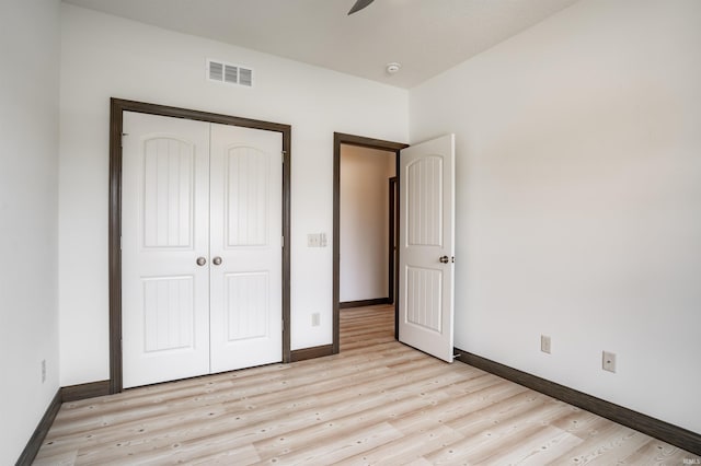 8622 Alamasa Pl, Fort Wayne, IN 46835 - unfurnished bedroom featuring a closet and light wood-style floors