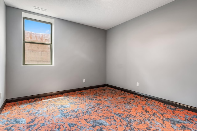 8622 Alamasa Pl, Fort Wayne, IN 46835 - empty room featuring carpet and a textured ceiling