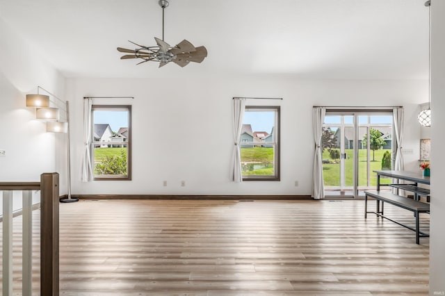 8622 Alamasa Pl, Fort Wayne, IN 46835 - unfurnished dining area featuring wood finished floors and a ceiling fan