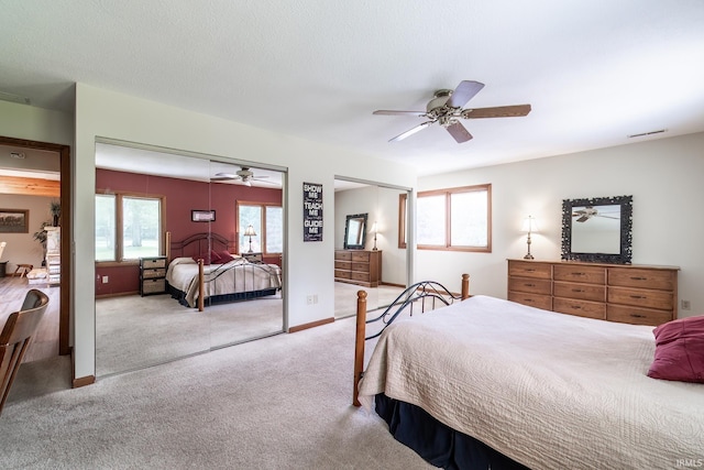 3836 W State Blvd, Fort Wayne, IN 46808 - bedroom with light carpet, multiple windows, and ceiling fan