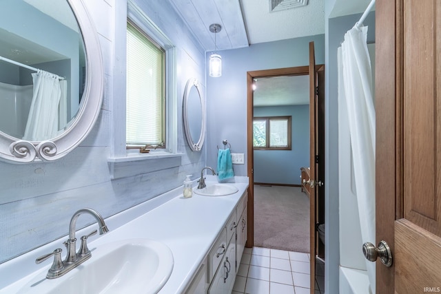 3836 W State Blvd, Fort Wayne, IN 46808 - bathroom featuring tile patterned flooring, double vanity, and a shower with curtain