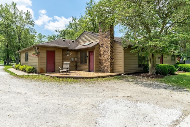 3836 W State Blvd, Fort Wayne, IN 46808 - single story home featuring a deck and a chimney