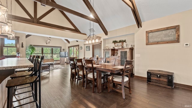 9345 Notestine Rd, Fort Wayne, IN 46835 - dining room featuring beam ceiling, dark wood-style floors, and high vaulted ceiling