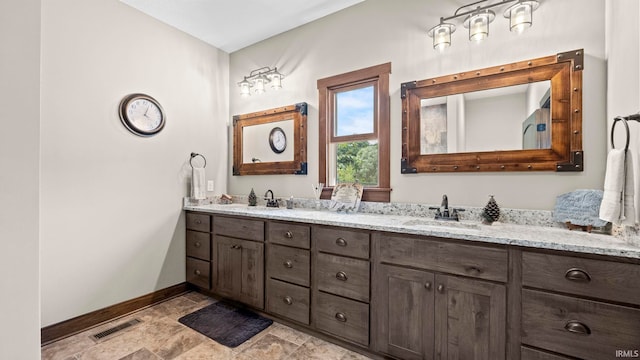 9345 Notestine Rd, Fort Wayne, IN 46835 - full bath with double vanity and baseboards