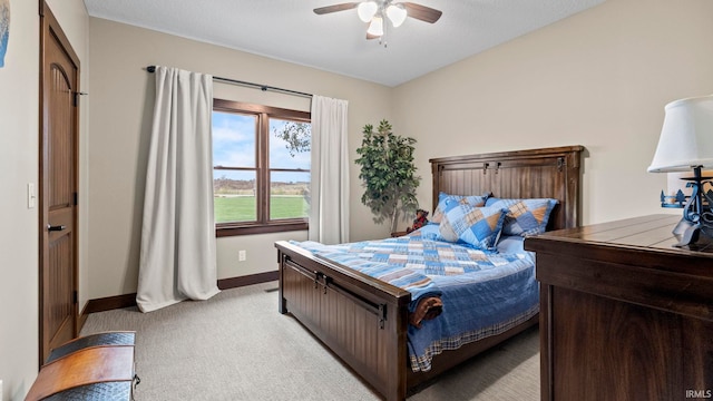 9345 Notestine Rd, Fort Wayne, IN 46835 - bedroom with light colored carpet and a ceiling fan
