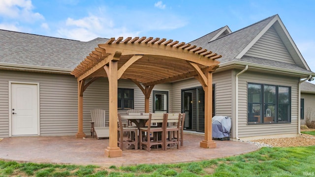 9345 Notestine Rd, Fort Wayne, IN 46835 - back of house with a pergola, a shingled roof, and a patio