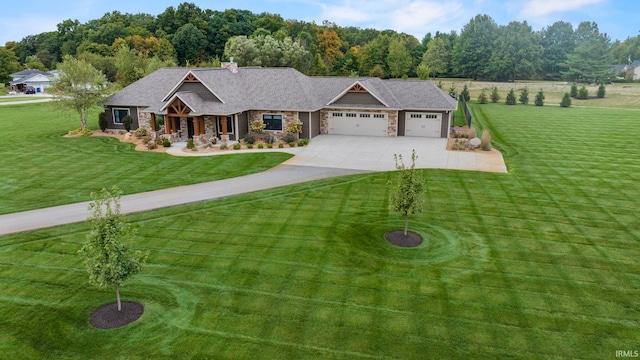 9345 Notestine Rd, Fort Wayne, IN 46835 - view of front of house featuring stone siding, an attached garage, driveway, a front yard, and a porch