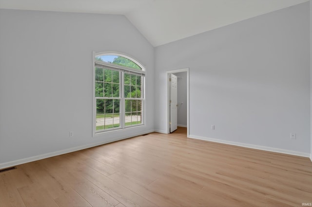 50588 Carrington Place Dr, South Bend, IN 46637 - unfurnished room with light wood finished floors and high vaulted ceiling