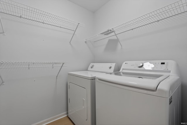 50588 Carrington Place Dr, South Bend, IN 46637 - laundry room featuring washer and dryer