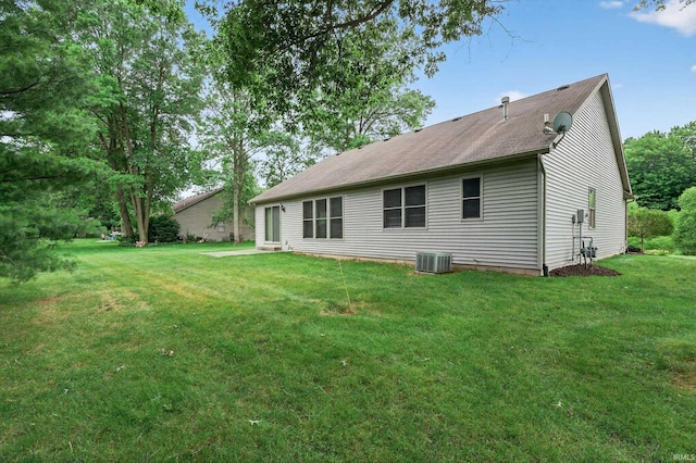 50588 Carrington Place Dr, South Bend, IN 46637 - rear view of property featuring a lawn