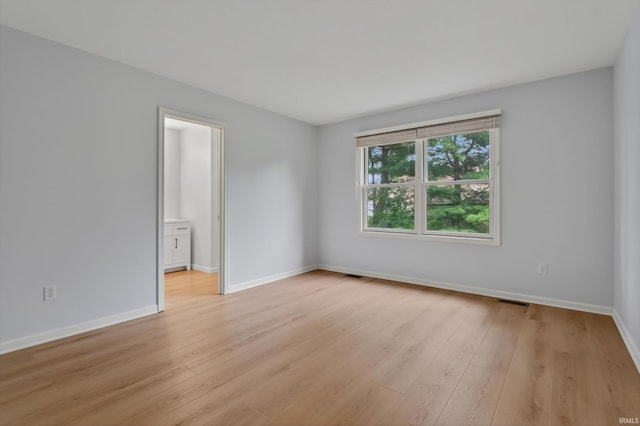 50588 Carrington Place Dr, South Bend, IN 46637 - empty room with light wood-style floors and baseboards