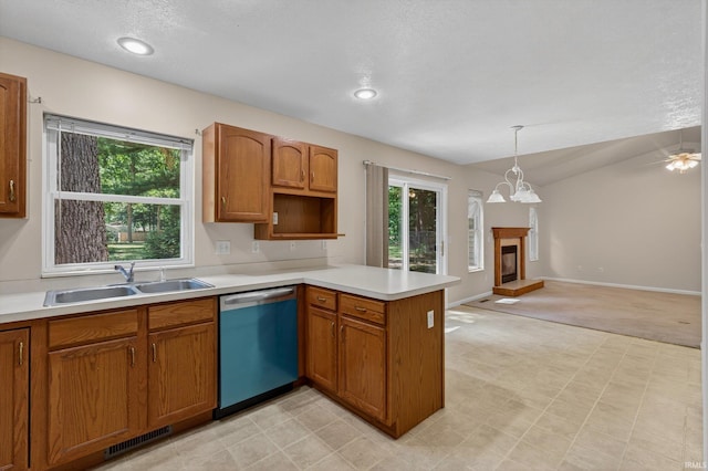 51613 Emmons Rd, South Bend, IN 46637 - kitchen with dishwasher, a peninsula, light countertops, plenty of natural light, and lofted ceiling
