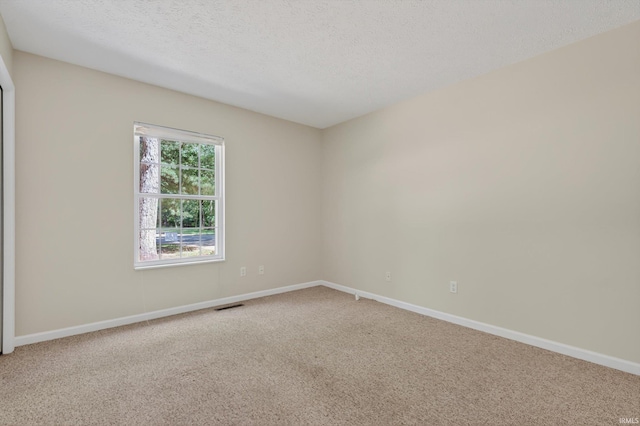 51613 Emmons Rd, South Bend, IN 46637 - carpeted spare room featuring baseboards and a textured ceiling