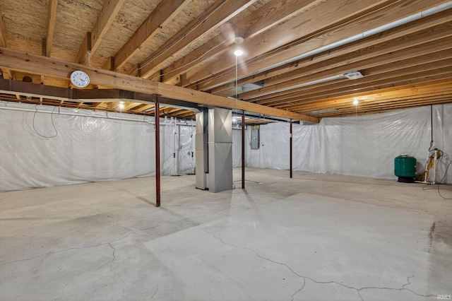 51613 Emmons Rd, South Bend, IN 46637 - unfinished basement with a water pressure tank, electric panel, and heating unit