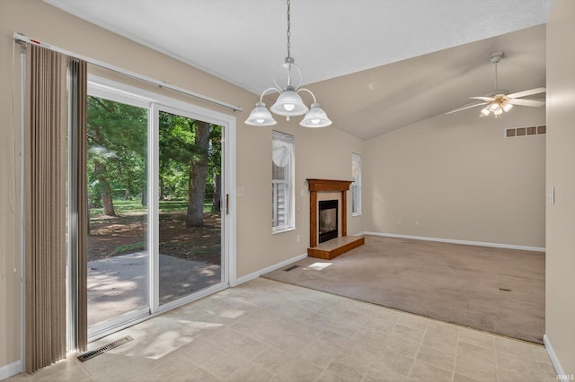 51613 Emmons Rd, South Bend, IN 46637 - unfurnished living room with light colored carpet, vaulted ceiling, a glass covered fireplace, a ceiling fan, and a chandelier
