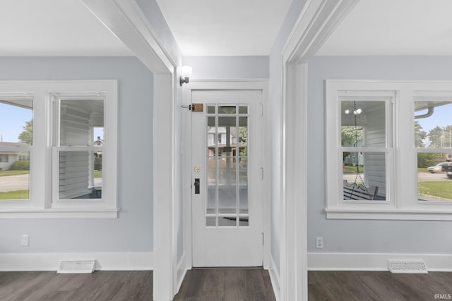 1323 Lincolnway E, Mishawaka, IN 46544 - entryway with baseboards and dark wood finished floors