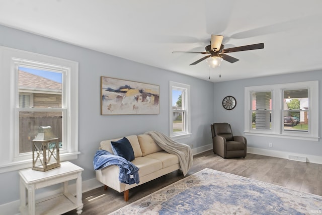 1323 Lincolnway E, Mishawaka, IN 46544 - living area with a ceiling fan and wood finished floors