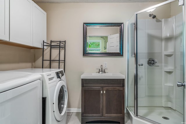 4648 Parkerdale Dr, Fort Wayne, IN 46815 - laundry room featuring washer and clothes dryer and cabinet space