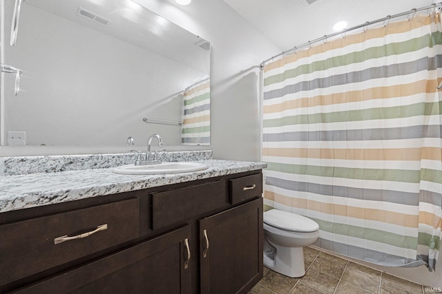 13072 Halen Hill Ct, Fort Wayne, IN 46818 - bathroom with vanity, a shower with shower curtain, and tile patterned flooring