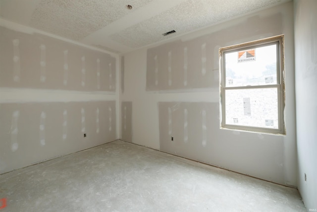 980 E Hawthorn Ln, Columbia City, IN 46725 - empty room featuring a textured ceiling