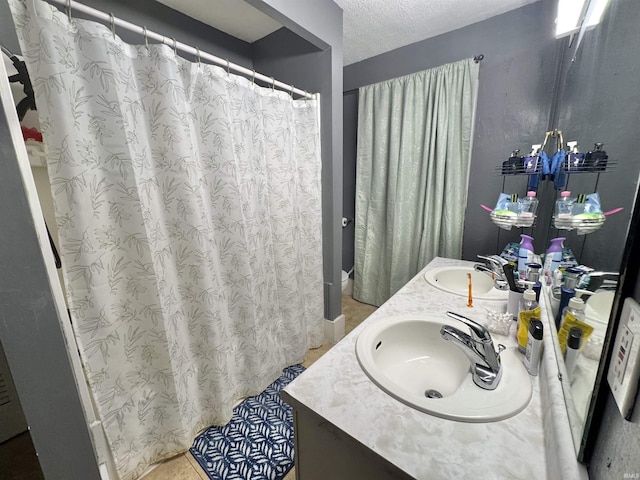 808 19th St, Logansport, IN 46947 - full bathroom with double vanity, a textured ceiling, and curtained shower